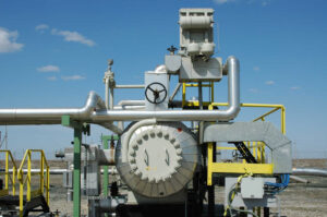 H₂S removal equipment with industrial piping and treatment vessels at an oil and gas facility.