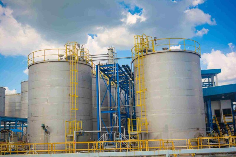 Industrial storage tanks and piping used to manage tank vent emissions.